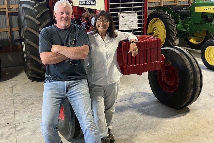 Shown in photo are Steve Taylor, a farmer from the Varna area, and Mari Veliz, Healthy Watersheds Manager at Ausable Bayfield Conservation. They took the opportunity to check out vintage tractors, cover crops, and strip tillage.